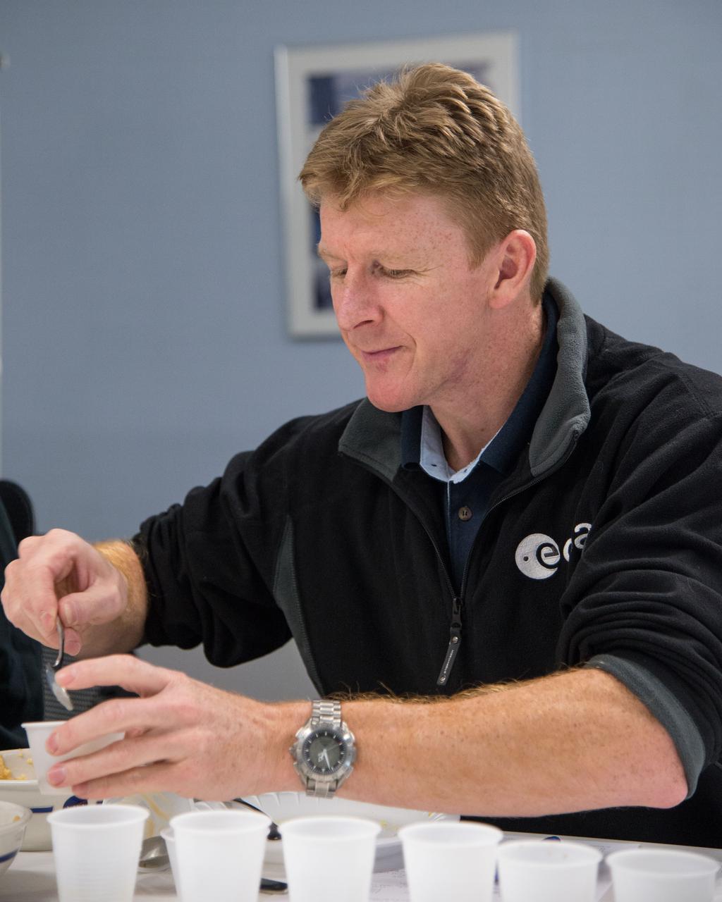 PHOTO DATE: 12-12-13 LOCATION: Bldg. 17, Rm 1070 - Food Lab SUBJECT: Soyuz 45 crew members, Tim Kopra and ESA astronaut Tim Peake during food tasting. PHOTOGRAPHER: BILL STAFFORD
