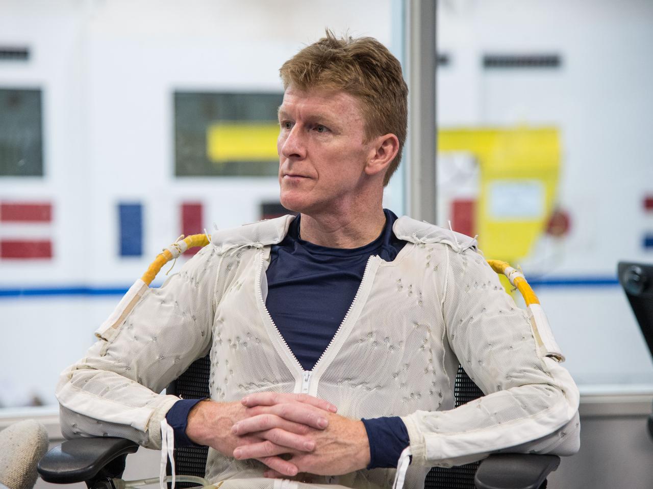 Date: 12-13-13 Location: NBL, Pool Topside Subject: Soyuz 45 crew members, Tim Kopra and ESA astronaut Tim Peake during ISS EVA Maintenance 1 - training at the NBL Photographer: James Blair/NASA