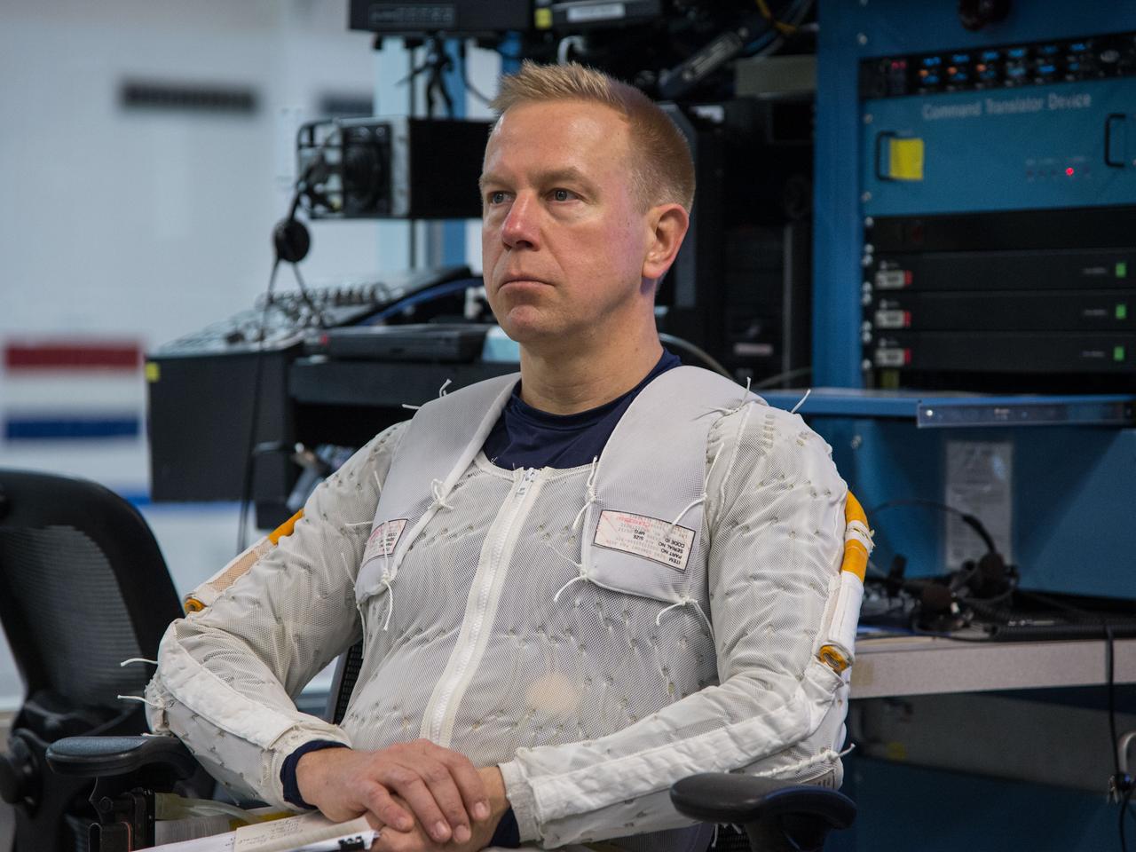 Date: 12-13-13 Location: NBL, Pool Topside Subject: Soyuz 45 crew members, Tim Kopra and ESA astronaut Tim Peake during ISS EVA Maintenance 1 - training at the NBL Photographer: James Blair/NASA