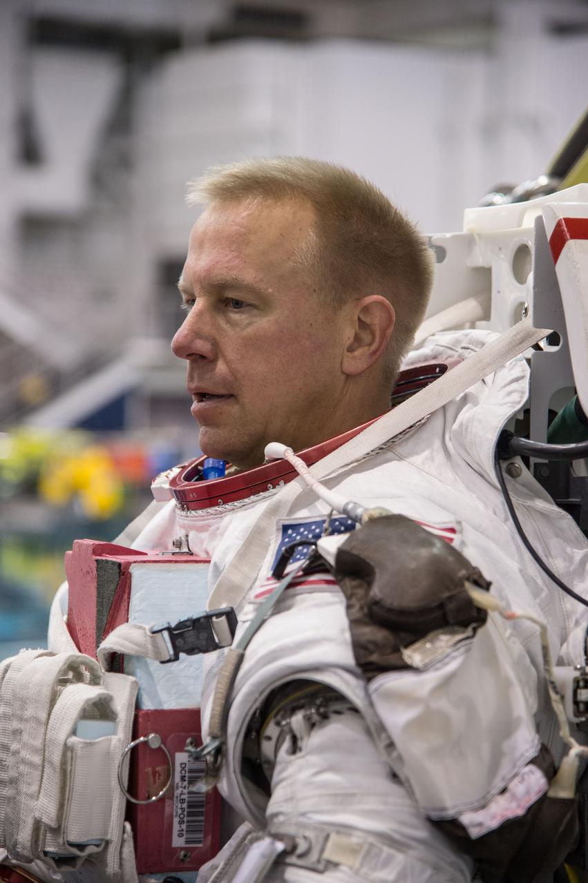 Date: 12-13-13 Location: NBL, Pool Topside Subject: Soyuz 45 crew members, Tim Kopra and ESA astronaut Tim Peake during ISS EVA Maintenance 1 - training at the NBL Photographer: James Blair/NASA