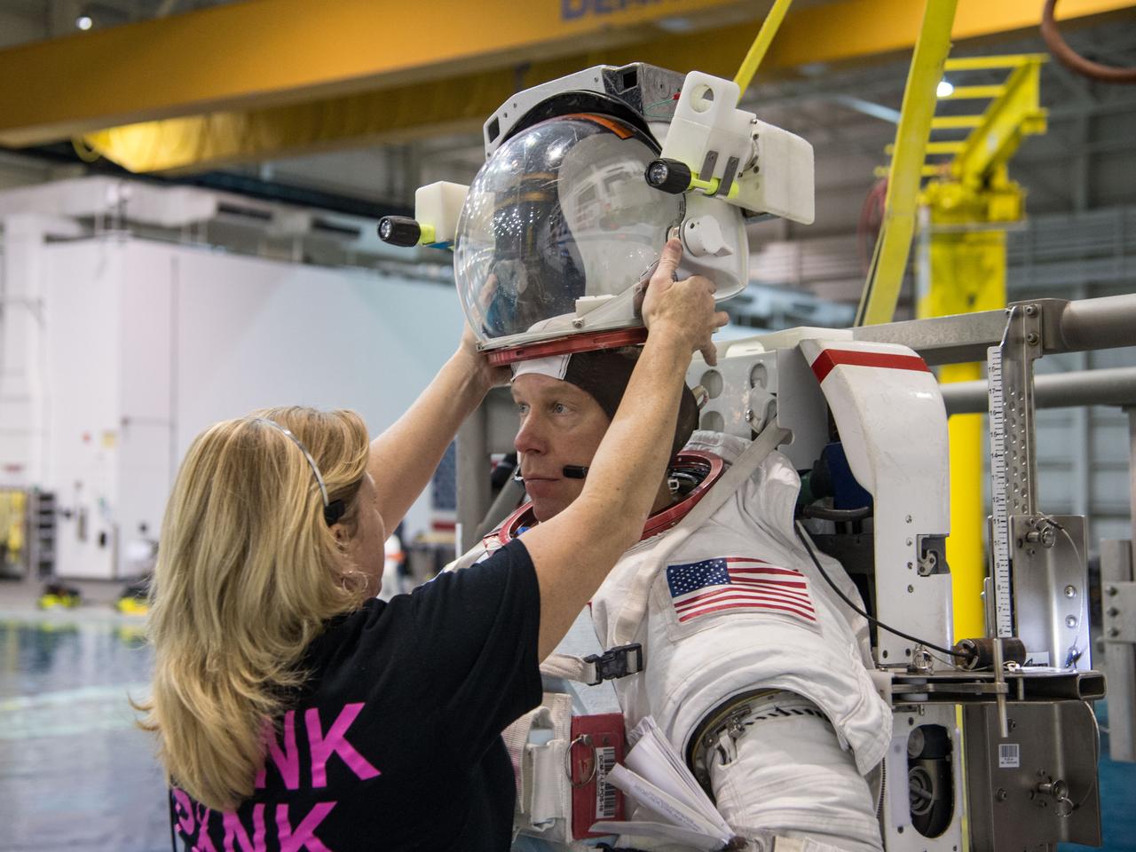 Date: 12-13-13 Location: NBL, Pool Topside Subject: Soyuz 45 crew members, Tim Kopra and ESA astronaut Tim Peake during ISS EVA Maintenance 1 - training at the NBL Photographer: James Blair/NASA