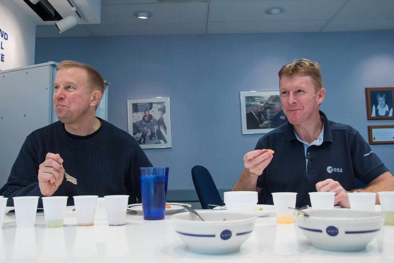 Date: 12-17-13 Location: Bldg 17, rm 1070 Food Lab Subject: Soyuz 45 crew members, Tim Kopra and ESA astronaut Tim Peake during food tasting in the JSC Food Lab Photographer: James Blair