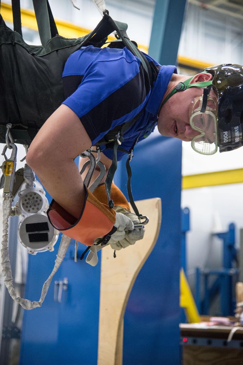 DATE: 1-7-14 LOCATION: Bldg. 9NW - POGO Stand SUBJECT: Expedition 44 astronaut Kjell Lindgren during ISS EVA POGO 1 training. PHOTOGRAPHER: Lauren Harnett