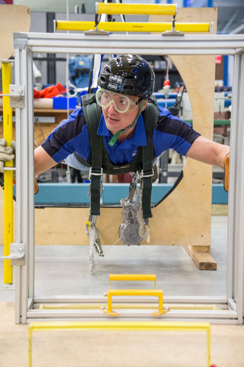 DATE: 1-7-14 LOCATION: Bldg. 9NW - POGO Stand SUBJECT: Expedition 44 astronaut Kjell Lindgren during ISS EVA POGO 1 training. PHOTOGRAPHER: Lauren Harnett