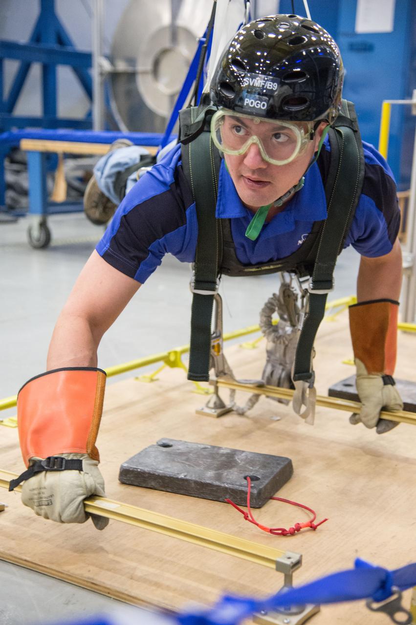 DATE: 1-7-14 LOCATION: Bldg. 9NW - POGO Stand SUBJECT: Expedition 44 astronaut Kjell Lindgren during ISS EVA POGO 1 training. PHOTOGRAPHER: Lauren Harnett