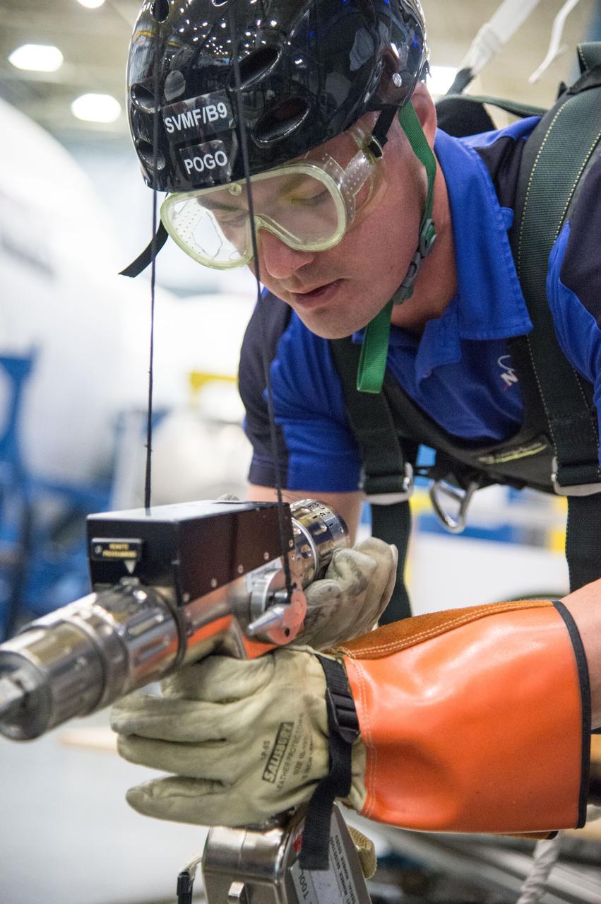 DATE: 1-7-14 LOCATION: Bldg. 9NW - POGO Stand SUBJECT: Expedition 44 astronaut Kjell Lindgren during ISS EVA POGO 1 training. PHOTOGRAPHER: Lauren Harnett