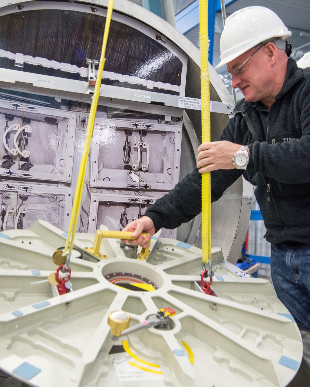 DATE: 1-7-14 LOCATION: Bldg. 9NW - POGO Stand SUBJECT: Astronaut Scott Kelly during ISS EVA POGO 1 training. PHOTOGRAPHER: Lauren Harnett