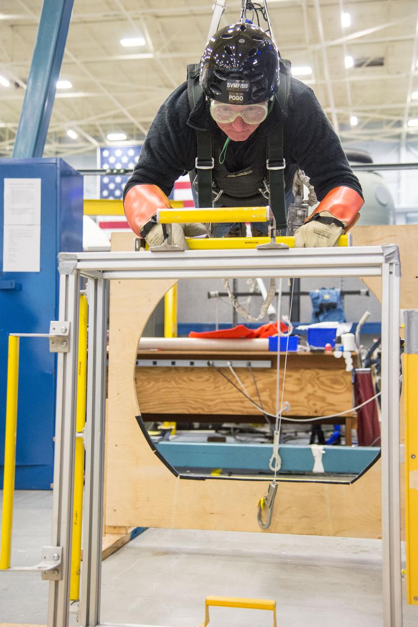 DATE: 1-7-14 LOCATION: Bldg. 9NW - POGO Stand SUBJECT: Astronaut Scott Kelly during ISS EVA POGO 1 training. PHOTOGRAPHER: Lauren Harnett