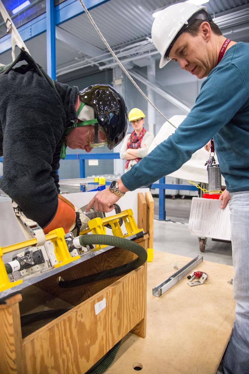 DATE: 1-7-14 LOCATION: Bldg. 9NW - POGO Stand SUBJECT: Astronaut Scott Kelly during ISS EVA POGO 1 training. PHOTOGRAPHER: Lauren Harnett
