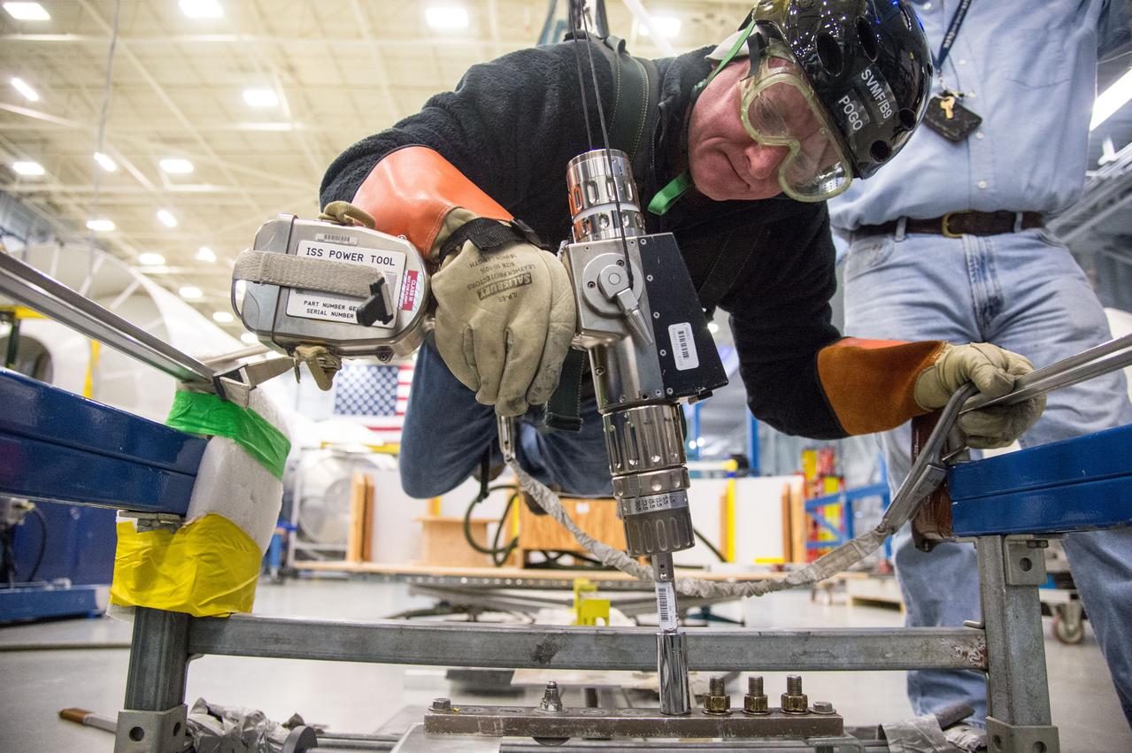 DATE: 1-7-14 LOCATION: Bldg. 9NW - POGO Stand SUBJECT: Astronaut Scott Kelly during ISS EVA POGO 1 training. PHOTOGRAPHER: Lauren Harnett