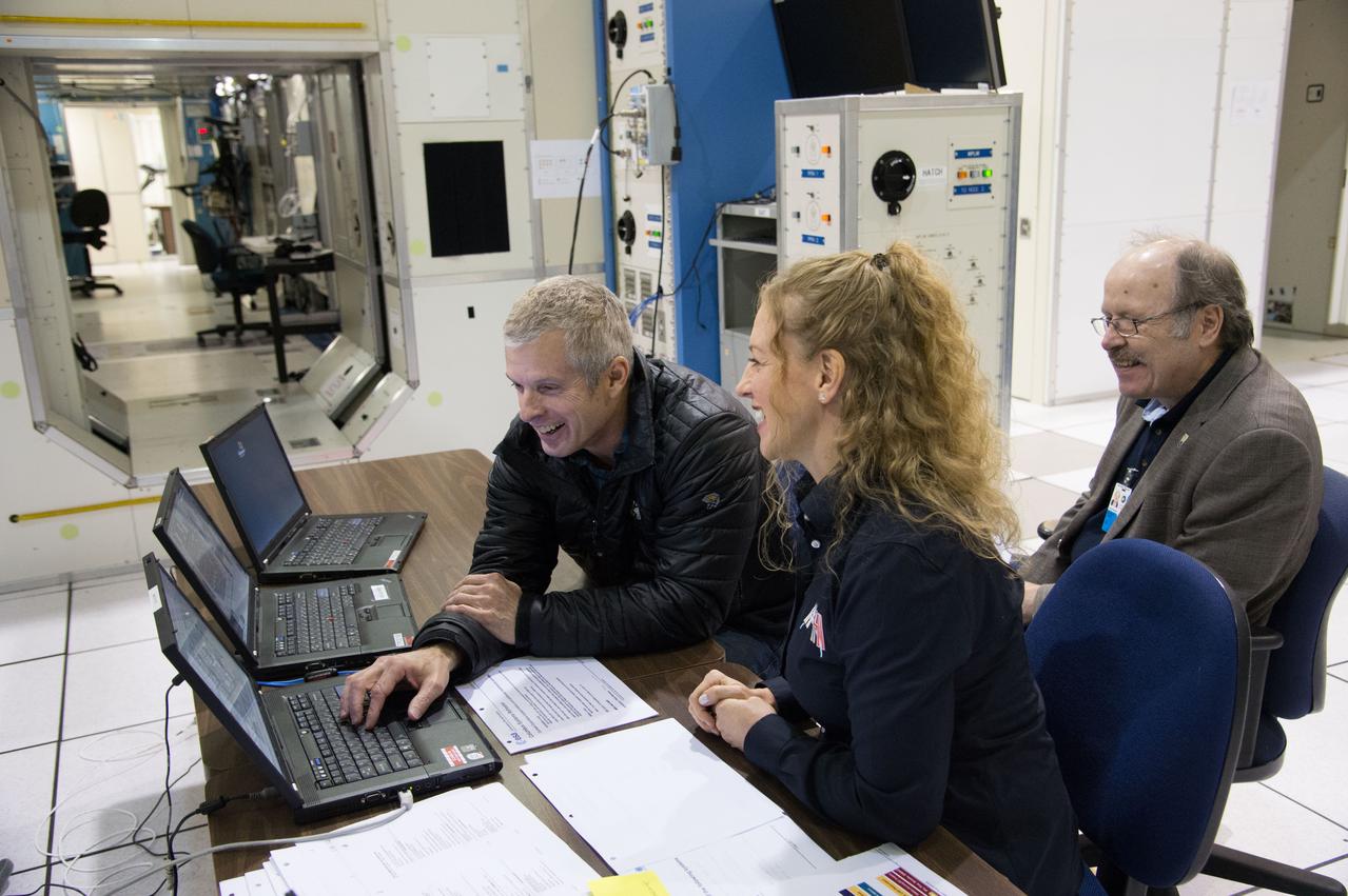 Expedition 40 crew member Steve Swanson with instructor Michaela Benda during crew training.  Photo Date: January 8, 2014.  Location: Building 5, SSTF.  Photographer: Robert Markowitz 