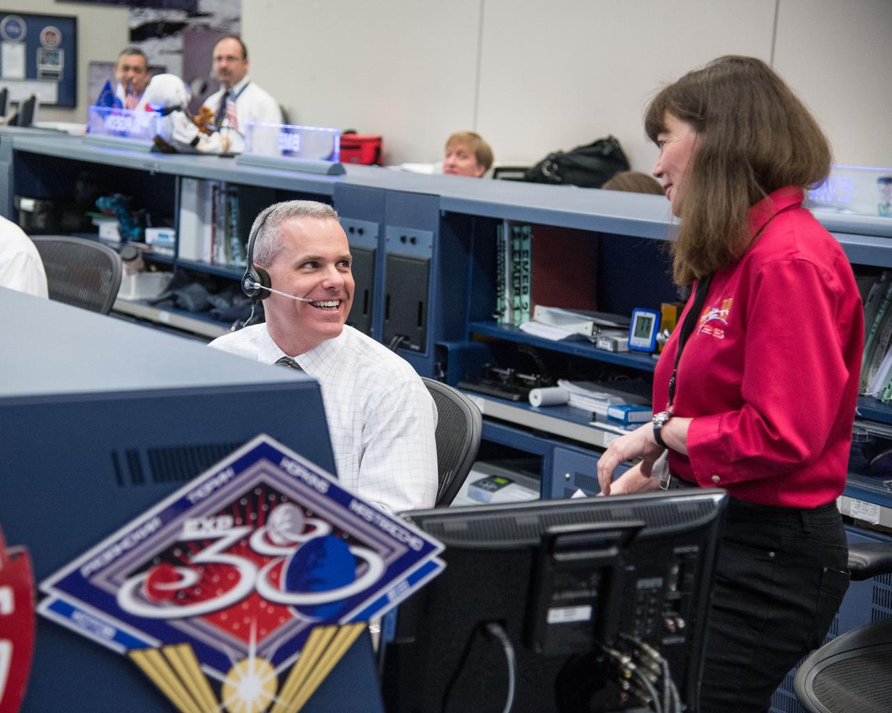 DATE: 1-12-14 LOCATION: Bldg. 30 - FCR-1 (30M/231) SUBJECT: Expedition 38 flight controllers during Orbital Sciences' Cygnus approaching ISS and being grappled. PHOTOGRAPHER: Lauren Harnett