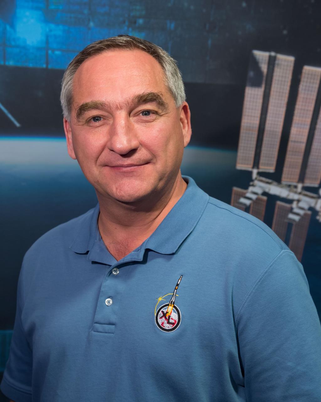 PHOTO DATE:  01-22-14 LOCATION:  Bldg. 2N, Press Conf. Room  SUBJECT: Expedition 40 (Soyuz 38) press conference with Steve Swanson (NASA), Alexander Skvortsov (RSA), and Oleg Artemyev (RSA).  PHOTOGRAPHER:  BILL STAFFORD