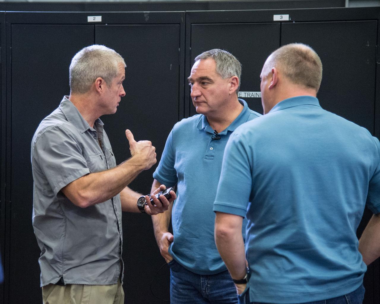 PHOTO DATE: 01-17-14 LOCATION: Bldg. 9NW - ISS Mockups SUBJECT: Expedition 40 6-person crew emergency scenarios. Crewmembers: 38S/Swanson, Skvortsov and Artemiev, along with 39S/Suraev, Wiseman and Gerst. PHOTOGRAPHER: BILL STAFFORD