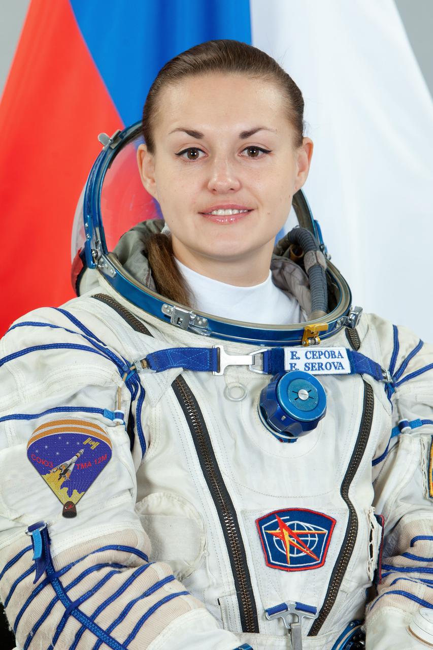 JSC2014-E-021426 (11 Dec. 2013) --- Russian cosmonaut Elena Serova, Expedition 39 backup crew member, attired in a Russian Sokol launch and entry suit, takes a break from training in Star City, Russia to pose for a portrait. Photo credit: Gagarin Cosmonaut Training Center