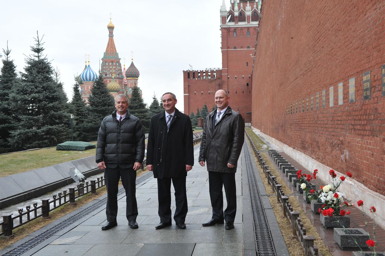 Taking time out from their ceremonial activities at the Kremlin in Moscow, Expedition 39/40 crewmembers Steve Swanson of NASA (left), Alexander Skvortsov of Roscosmos (center) and Oleg Artemyev of Roscosmos (right) pose for pictures by the Kremlin Wall March 6 where Russian space icons are interred. Swanson, Skvortsov and Artemyev are preparing for their launch to the International Space Station from the Baikonur Cosmodrome in Kazakhstan March 26, Kazakh time, in their Soyuz TMA-12M spacecraft for a six-month mission. NASA/Stephanie Stoll