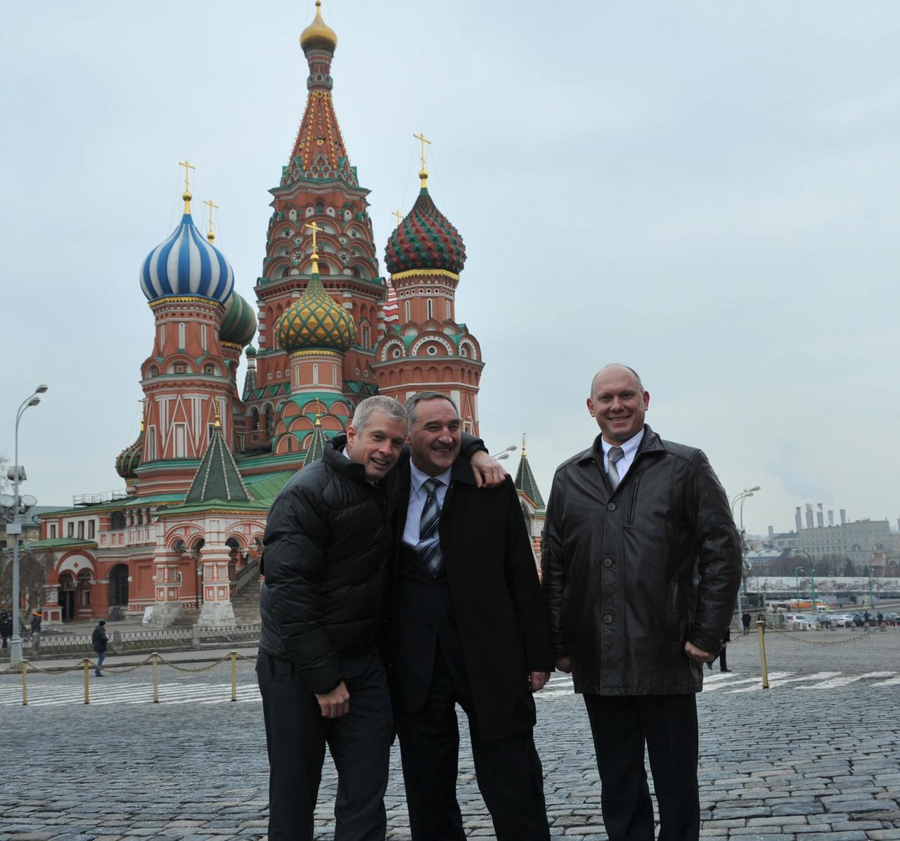 Striking a pose in front of St. Basil’s Cathedral at Red Square in Moscow, Expedition 39/40 crewmembers Steve Swanson of NASA (left), Alexander Skvortsov of Roscosmos (center) and Oleg Artemyev of Roscosmos (right) took time from ceremonial activities March 6 for a photo opportunity. Swanson, Skvortsov and Artemyev are preparing for their launch to the International Space Station from the Baikonur Cosmodrome in Kazakhstan March 26, Kazakh time, in their Soyuz TMA-12M spacecraft for a six-month mission.  NASA/Stephanie Stoll 