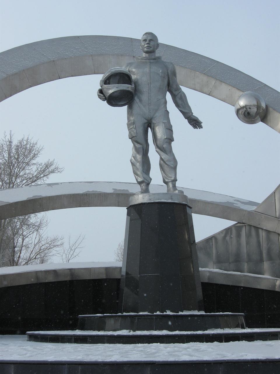 (9 March 2014) --- The statue of Yuri Gagarin, the first human to fly in space, looms over the town square in Karaganda, Kazakhstan March 9 as officials prepared to commemorate him on his 80th birthday. Gagarin, who died in an aircraft training accident in 1968, was launched into the history books from the Baikonur Cosmodrome in Kazakhstan on April 12, 1961. NASA astronauts and officials were in Karaganda for the commemoration in advance of supporting the landing March 11, Kazakh time, of Expedition 38 crew members Oleg Kotov, Sergey Ryazanskiy and NASA’s Michael Hopkins in their Soyuz TMA-10M spacecraft. Photo credit: NASA