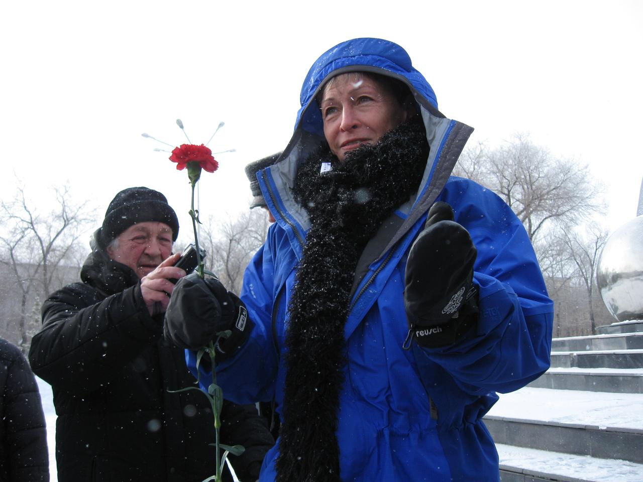 (9 March 2014) --- In Karaganda, Kazakhstan, NASA astronaut Peggy Whitson delivered remarks March 9 as she prepared to lay flowers at the statue of Yuri Gagarin, the first human to fly in space, in commemoration of his 80th birthday. Gagarin, who died in an aircraft training accident in 1968, was launched into the history books from the Baikonur Cosmodrome in Kazakhstan on April 12, 1961. Whitson and other NASA astronauts and officials were in Karaganda for the commemoration in advance of supporting the landing March 11, Kazakh time, of Expedition 38 crew members Oleg Kotov, Sergey Ryazanskiy and NASA’s Michael Hopkins in their Soyuz TMA-10M spacecraft. Photo credit: NASA
