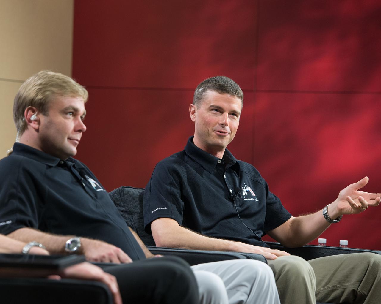 PHOTO DATE:  03-18-14 LOCATION: Bldg. 2s - PAO Studio B  SUBJECT: Expedition 41 (Soyuz 39) press conference with Maxim Suraev, Alexander Gerst and Reid Wiseman. PHOTOGRAPHER:   BILL STAFFORD