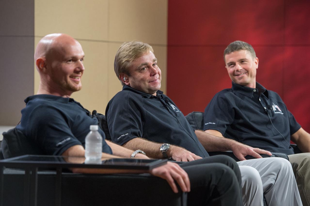 PHOTO DATE:  03-18-14 LOCATION: Bldg. 2s - PAO Studio B  SUBJECT: Expedition 41 (Soyuz 39) press conference with Maxim Suraev, Alexander Gerst and Reid Wiseman. PHOTOGRAPHER:   BILL STAFFORD