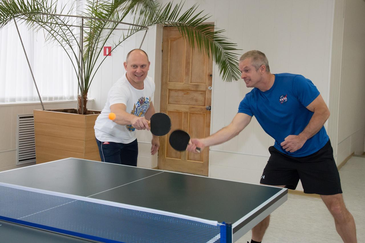 19-12-04-43: At their Cosmonaut Hotel crew quarters in Baikonur, Kazakhstan, Expedition 39/40 Flight Engineer Steve Swanson of NASA (right) and Flight Engineer Oleg Artemyev of the Russian Federal Space Agency (Roscosmos; left) play a game of Ping-Pong March 19 as they prepare for their launch to the International Space Station with their crewmate, Alexander Skvortsov of Roscosmos, on March 26, Kazakh time, in the Soyuz TMA-12M spacecraft for a six-month mission. NASA/Victor Zelentsov