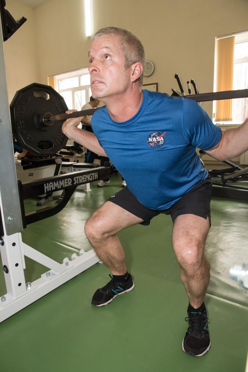 19-12-18-04:  At his Cosmonaut Hotel crew quarters in Baikonur, Kazakhstan, Expedition 39/40 Flight Engineer Steve Swanson of NASA gets in a workout March 19 as he prepares for launch to the International Space Station with his crewmates, Alexander Skvortsov and Oleg Artemyev of the Russian Federal Space Agency (Roscosmos) on March 26, Kazakh time, in the Soyuz TMA-12M spacecraft for a six-month mission.  NASA/Victor Zelentsov 