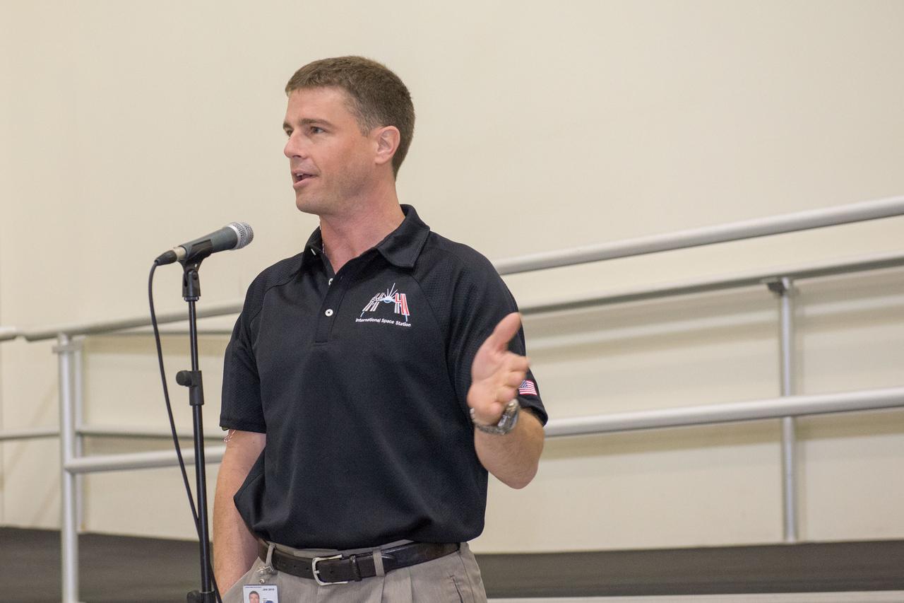 PHOTO DATE: 3-19-14 LOCATION: Bldg. 5 - High Bay SUBJECT: Soyuz 39 crew members (Expedition 41), Maxim Suraev, Greg Wiseman, Alexander Gerst during SSTF Cake Cutting Ceremony marking the end of their training. PHOTOGRAPHER: Lauren Harnett