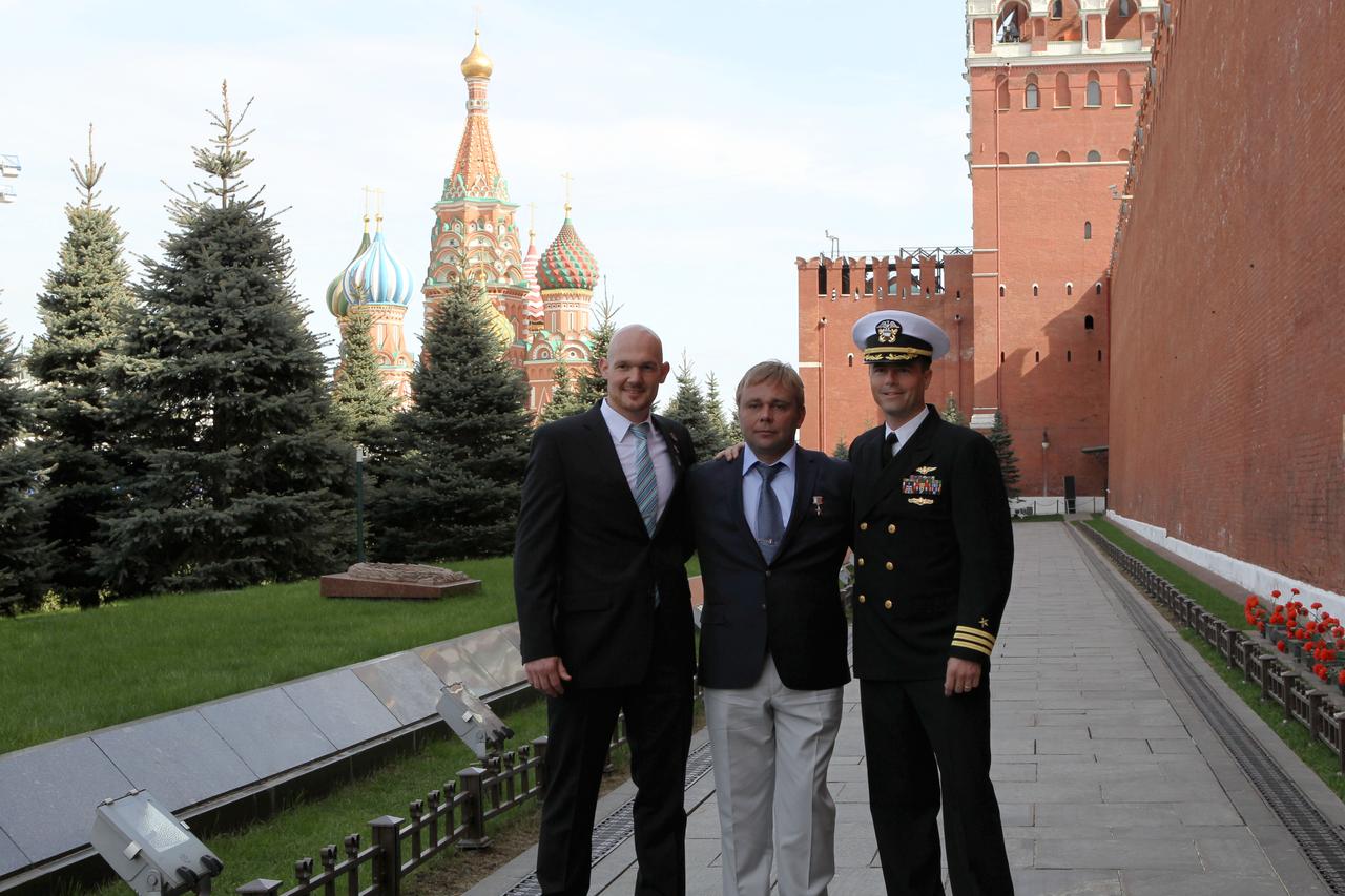 1254: With St. Basil’s Cathedral in the background at Moscow’s Red Square, Expedition 40/41 Flight Engineer Alexander Gerst of the European Space Agency (left), Soyuz Commander Max Suraev of the Russian Federal Space Agency (Roscosmos, center) and Flight Engineer Reid Wiseman of NASA (right) pose for pictures May 8 after laying flowers at the Kremlin Wall where Russian space icons are interred. The trio is preparing for launch May 29, Kazakh time, in the Soyuz TMA-13M spacecraft from the Baikonur Cosmodrome in Kazakhstan for a 5 ½ month mission on the International Space Station. NASA/Stephanie Stoll