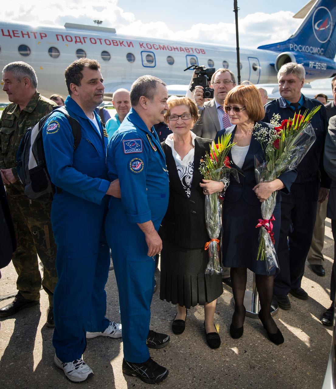20140514_1BI5658 Expedition 38/39 Flight Engineer Mikhail Tyurin of the Russian Federal Space Agency (Roscosmos) is welcomed home upon his return at Chkalovsky Airport in Russia, Wednesday, May 14, 2014, a few hours after landing in the Soyuz TMA-11M spacecraft in Kazakhstan. Tyurin, along with Expedition 39 Commander Koichi Wakata of the Japan Aerospace Exploration Agency and NASA Flight Engineer Rick Mastracchio (not pictured) completed 188 days in space following their launch in November, 2013. Photo Credit: (NASA/Bill Ingalls)