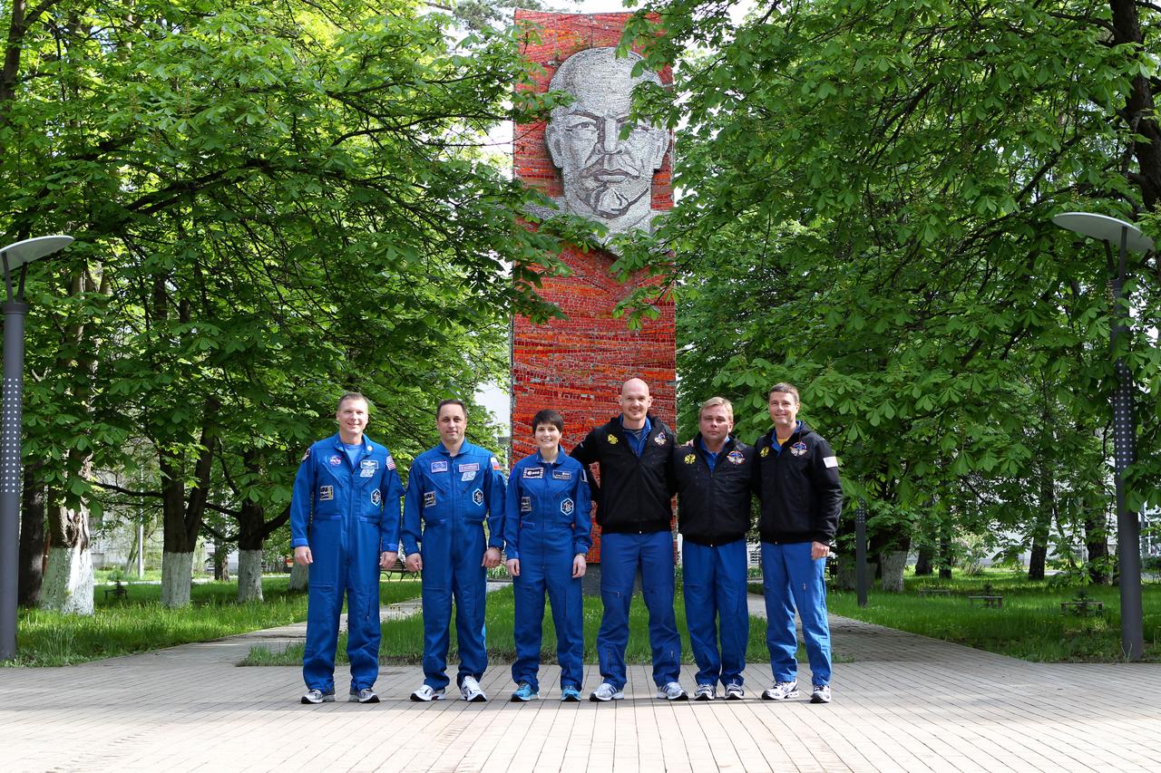 1535:  With the statue of Vladimir Lenin in the background at the Gagarin Cosmonaut Training Center in Star City, Russia, the Expedition 40/41 prime and backup crewmembers pose for pictures May 15 prior to their departure for the Baikonur Cosmodrome in Kazakhstan for final pre-launch training. From left to right are backup crewmembers Terry Virts of NASA, Anton Shkaplerov of the Russian Federal Space Agency (Roscosmos) and Samantha Cristoforetti of the European Space Agency, and prime crewmembers  Alexander Gerst of the European Space Agency, Soyuz Commander Max Suraev of Roscosmos and Reid Wiseman of NASA. Wiseman, Suraev and Gerst will launch on May 29, Kazakh time, in the Soyuz TMA-13M spacecraft from Baikonur for a 5 ½ month mission on the International Space Station.  NASA/Stephanie Stoll 