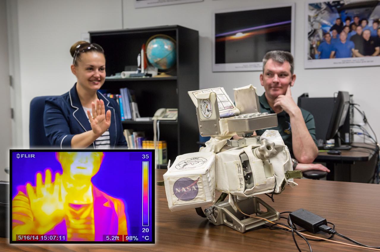 PHOTO DATE: 05/16/14 LOCATION: JSC B4 ROOM 1303 SUBJECT:  Soyuz 40 (Expedition 42) Russian cosmonauts Alexander Samokutyaye and Yelena Serova during EVA IR Camera EQ training with instructor Katrina Willoughby PHOTOGRAPHER: GEESEMAN