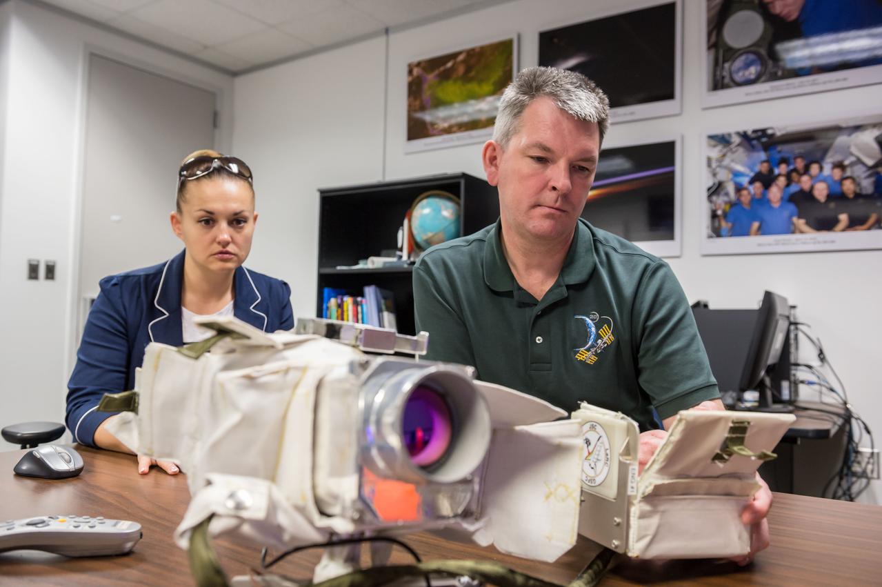 PHOTO DATE: 05/16/14 LOCATION: JSC B4 ROOM 1303 SUBJECT:  Soyuz 40 (Expedition 42) Russian cosmonauts Alexander Samokutyaye and Yelena Serova during EVA IR Camera EQ training with instructor Katrina Willoughby PHOTOGRAPHER: GEESEMAN