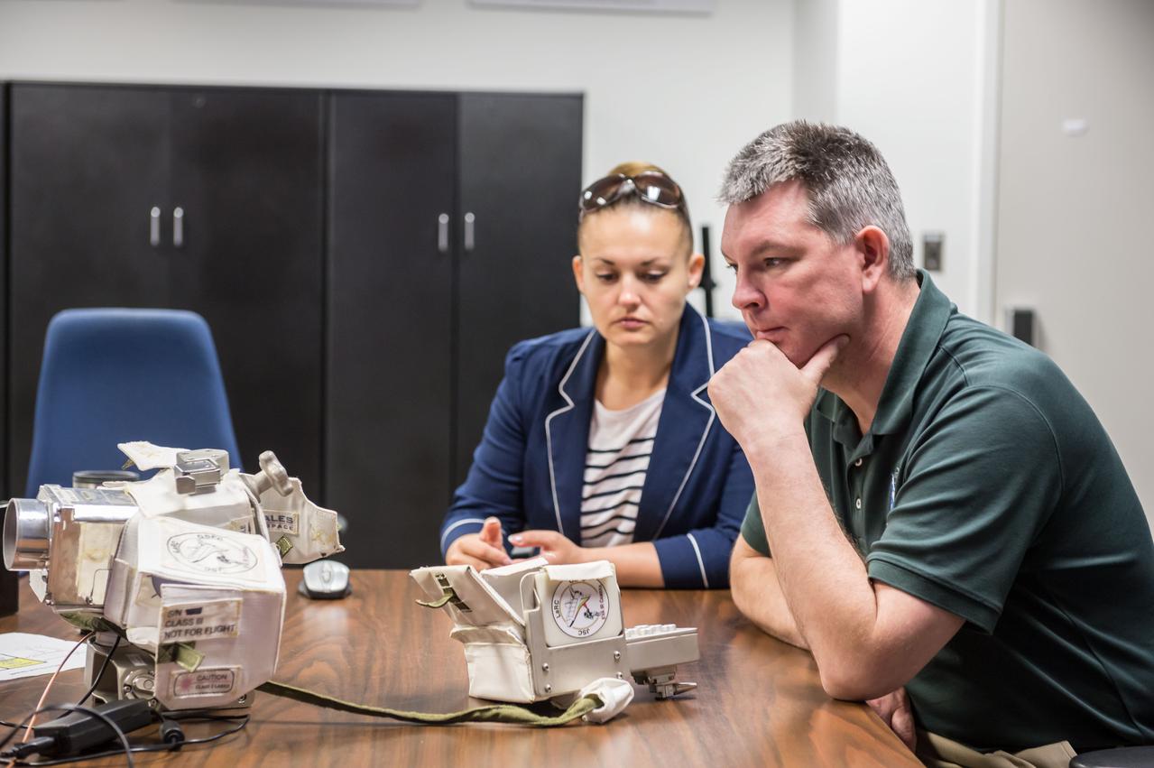 PHOTO DATE: 05/16/14 LOCATION: JSC B4 ROOM 1303 SUBJECT:  Soyuz 40 (Expedition 42) Russian cosmonauts Alexander Samokutyaye and Yelena Serova during EVA IR Camera EQ training with instructor Katrina Willoughby PHOTOGRAPHER: GEESEMAN