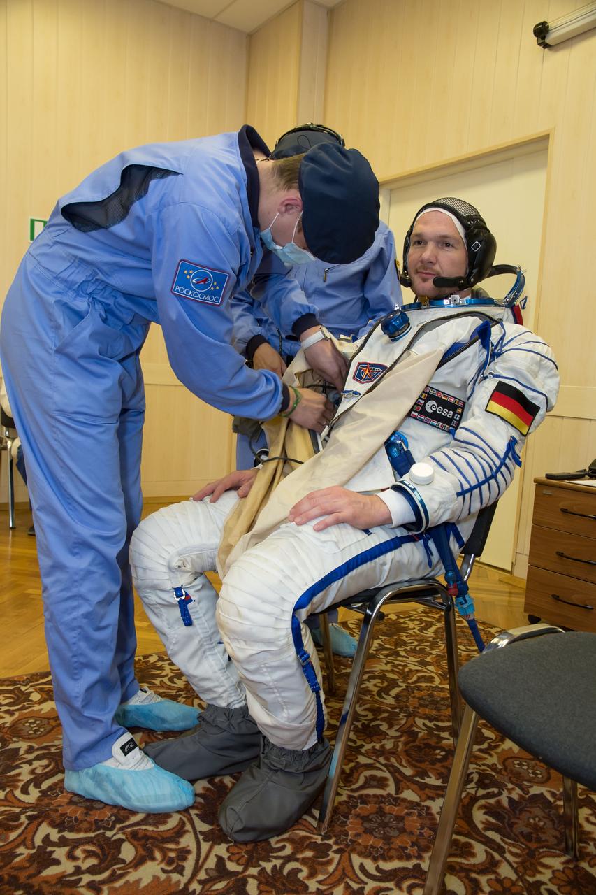 12-01-15-4:  At the Baikonur Cosmodrome in Kazakhstan, Expedition 40/41 Flight Engineer Alexander Gerst of the European Space Agency suits up in his Russian Sokol launch and entry suit May 16 for a dress rehearsal “fit check” in the Soyuz TMA-13M spacecraft. Gerst, Soyuz Commander Max Suraev of the Russian Federal Space Agency (Roscosmos) and Flight Engineer Reid Wiseman of NASA will launch from Baikonur on May 29, Kazakh time, for a 5 ½ month mission on the International Space Station.  NASA/Victor Zelentsov 