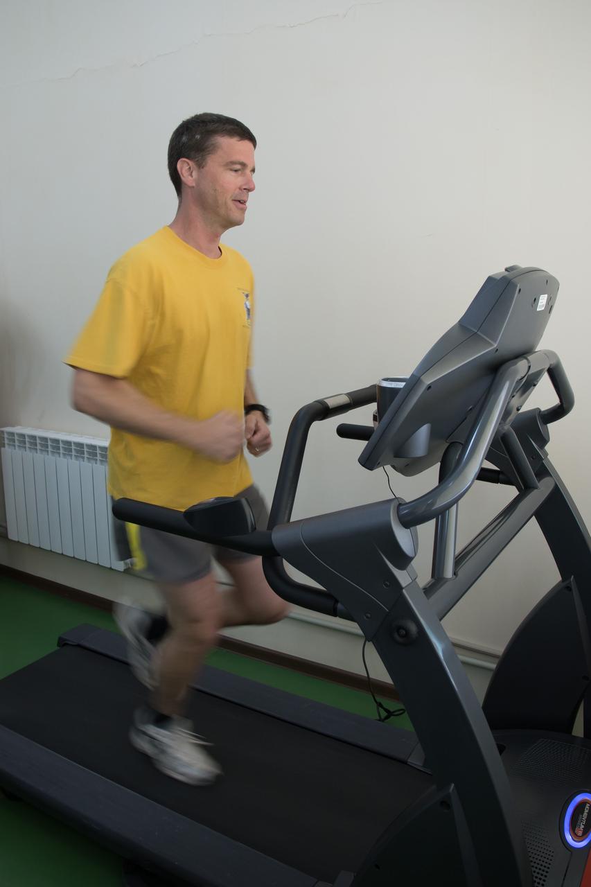 13-07-37-5: At the Cosmonaut Hotel crew quarters in Baikonur, Kazakhstan, Expedition 40/41 Flight Engineer Reid Wiseman of NASA gets in some exercise May 21 during pre-launch medical tests. Wiseman, Soyuz Commander Max Suraev of the Russian Federal Space Agency (Roscosmos) and Flight Engineer Alexander Gerst of the European Space Agency will launch on May 29, Kazakh time, on the Soyuz TMA-13M spacecraft from the Baikonur Cosmodrome for a 5 ½ month mission on the International Space Station. NASA/Victor Zelentsov