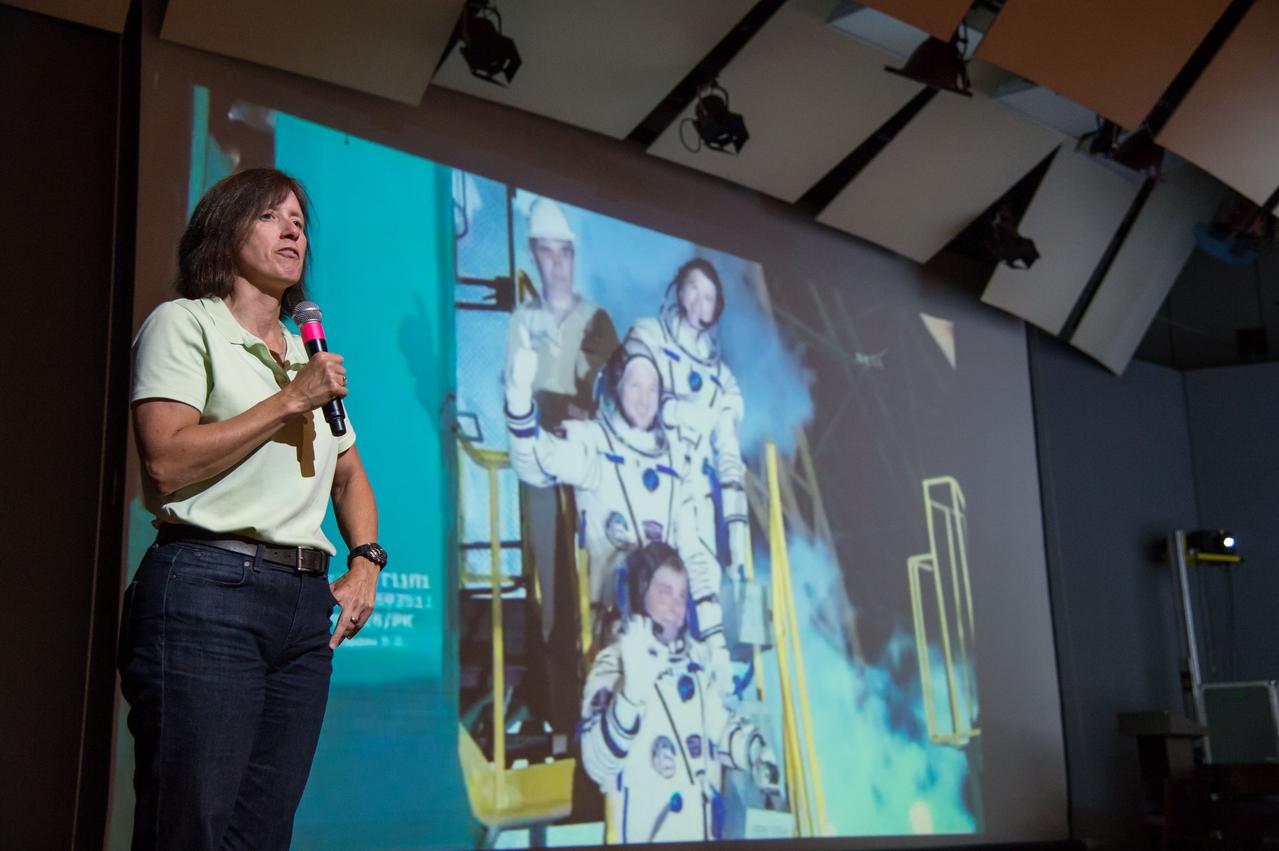 Date: 05-28-14 Location: Bldg 2, Teague Subject: Shannon Walker welcome those on-site to the Teague Auditorium to watch the live coverage of Expedition 40/41 (Soyuz 39) launch as it unfolds. Photographer: James Blair
