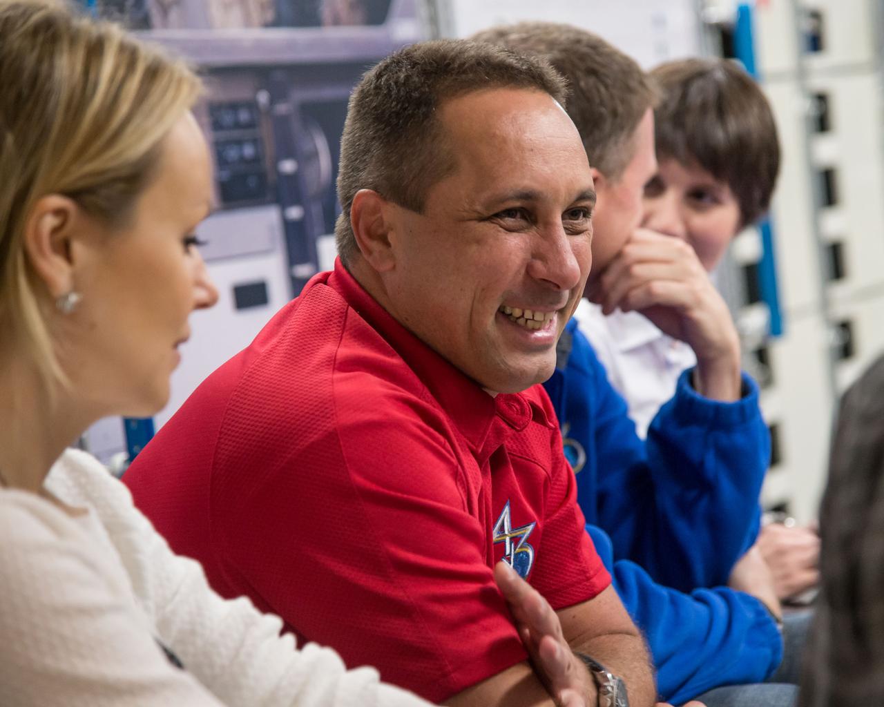  PHOTO DATE:  06-27-14 LOCATION:  Bldg. 9NW - ISS Mockups SUBJECT:  Expedition 42/43 (Soyuz 41) crew members Terry Virts, Samantha Cristoforetti and Anton Shakaplerov during Mega Code 2 training with instructor Melinda Hailey. PHOTOGRAPHER:  BILL STAFFORD