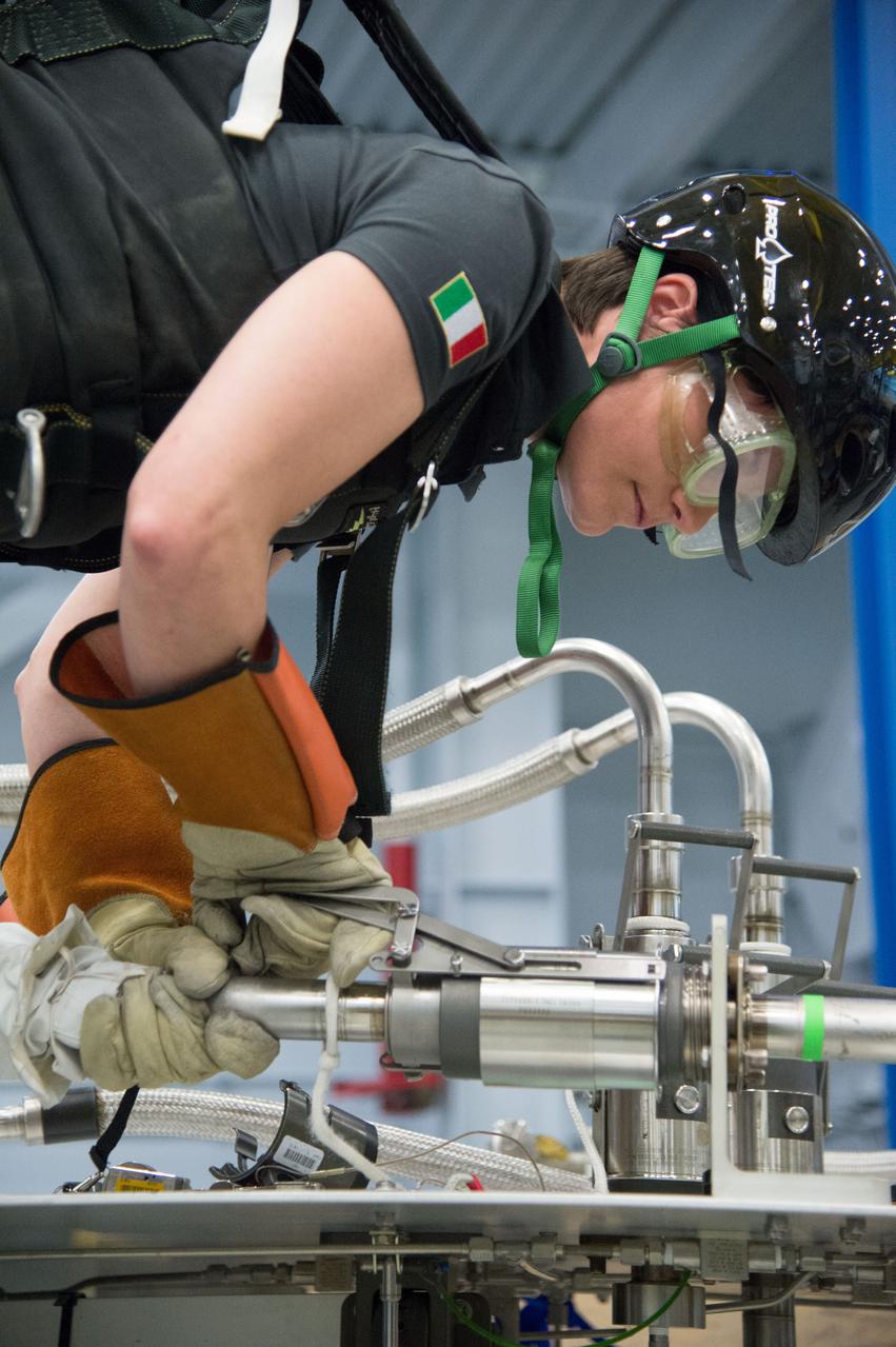 DATE: 6-25-14 LOCATION: Bldg 9NW - POGO SUBJECT: Expedition 42/43 ESA astronaut Samantha Cristoforetti during ISS EVA POGO 2 training with instructor Sandy Fletcher.  PHOTOGRAPHER: Lauren Harnett