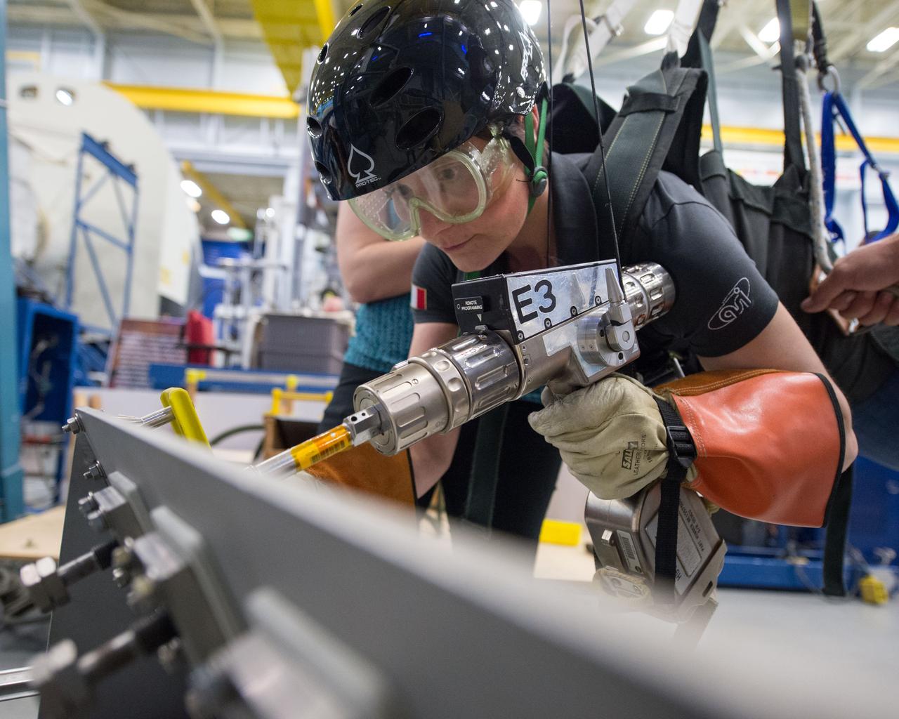 DATE: 6-25-14 LOCATION: Bldg 9NW - POGO SUBJECT: Expedition 42/43 ESA astronaut Samantha Cristoforetti during ISS EVA POGO 2 training with instructor Sandy Fletcher.  PHOTOGRAPHER: Lauren Harnett