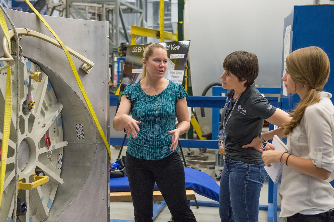 DATE: 6-25-14 LOCATION: Bldg 9NW - POGO SUBJECT: Expedition 42/43 ESA astronaut Samantha Cristoforetti during ISS EVA POGO 2 training with instructor Sandy Fletcher.  PHOTOGRAPHER: Joe DeMartino
