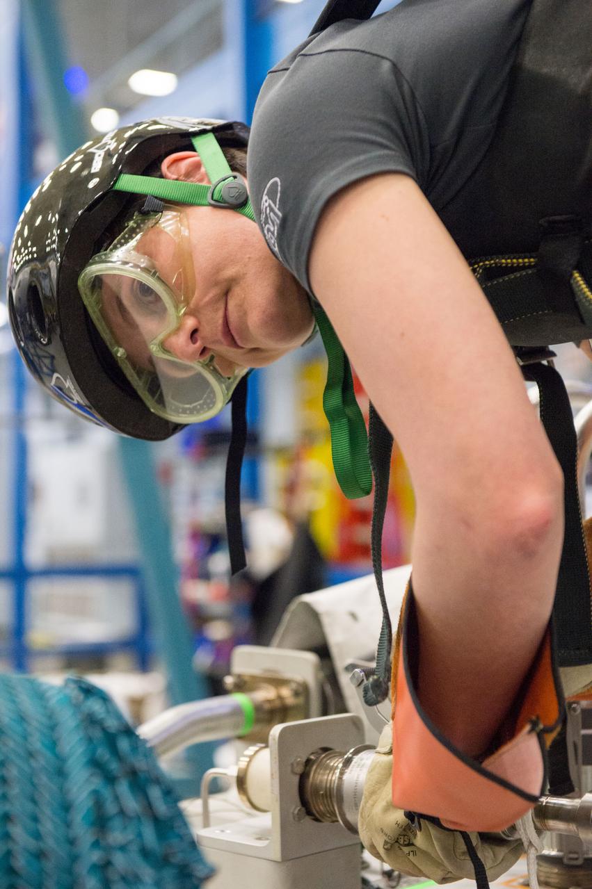 DATE: 6-25-14 LOCATION: Bldg 9NW - POGO SUBJECT: Expedition 42/43 ESA astronaut Samantha Cristoforetti during ISS EVA POGO 2 training with instructor Sandy Fletcher.  PHOTOGRAPHER: Joe DeMartino