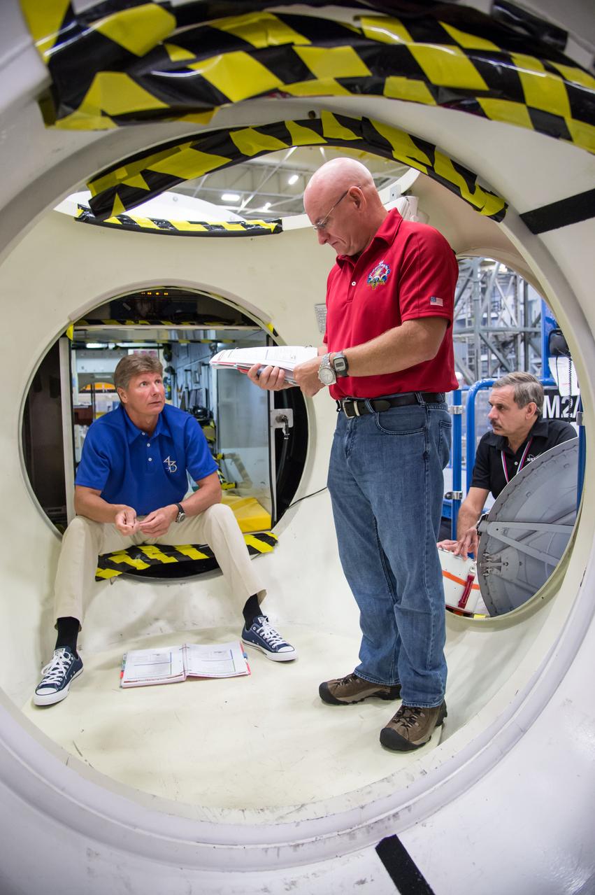 Date: 07-03-14 Location: Bldg 9, ISS Mockups Subject: Soyuz 42S (Expedition 44/45/46) crew members during Emergency Scenarios training in ISS mockups with astronaut Scott Kelly, cosmonauts Mikhail Kornienko and Genady Padalka. Photographer: James Blair
