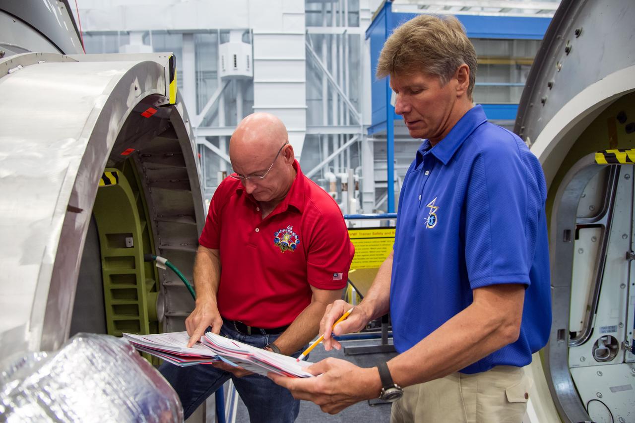 Date: 07-03-14 Location: Bldg 9, ISS Mockups Subject: Soyuz 42S (Expedition 44/45/46) crew members during Emergency Scenarios training in ISS mockups with astronaut Scott Kelly, cosmonauts Mikhail Kornienko and Genady Padalka. Photographer: James Blair