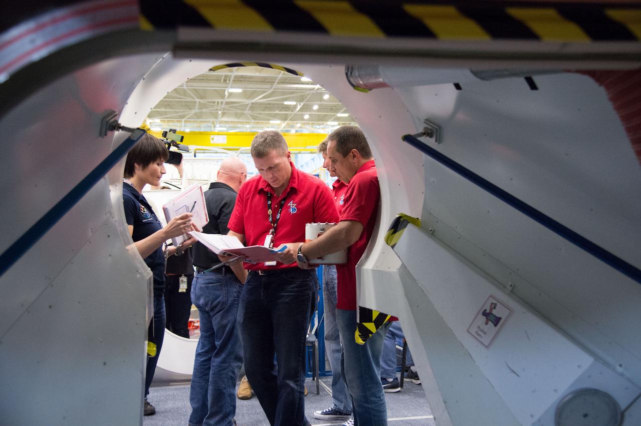 Expedition 43 Emergency Scenarios training in ISS mockups with Soyuz 41(Anton Shkaplerov, Samantha Cristoforetti, Terry Virts) and Soyuz 42 (Gennady Padalka, Mikhail Kornienko, Scott Kelly).  Photo Date: July 10, 2014.  Location: Building 9NW - ISS Mockups.  Photographer: Robert Markowitz