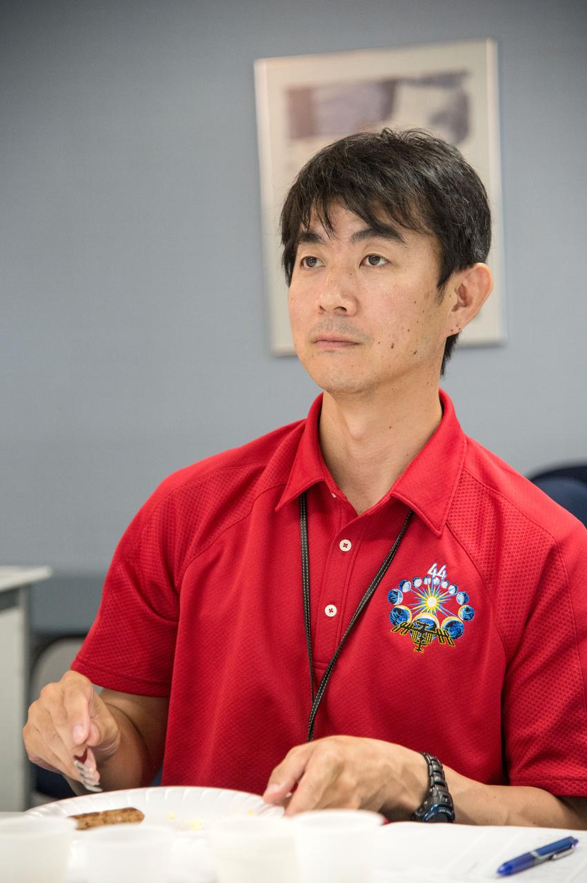 PHOTO DATE:  07-10-14 LOCATION:  Bldg. 17, Room 1070 - Food Lab  SUBJECT:  Soyuz 43 (Expedition 44/45) crew members Kjell Lindgren and Kimiya Yui during Food Tasting #2. PHOTOGRAPHER: BILL STAFFORD