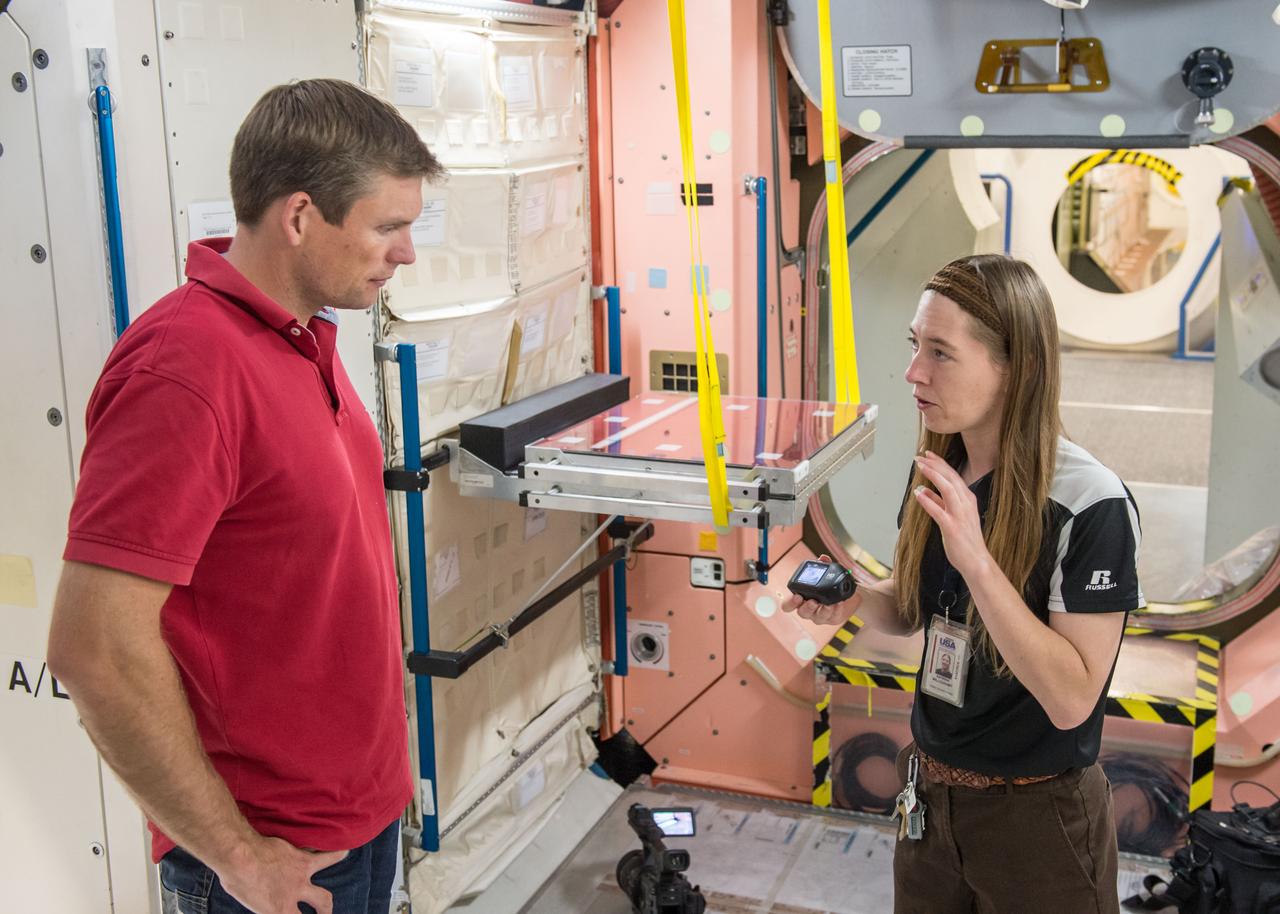 Date:08-19-2014 Location:B9NW Node 1 Subject:Photograph ESA Astronaut Andreas Mogensen on behalf of ESA during INT TV OPS USER training with instructor Katrina Willoughby. Post on IO/ISS Missions/ISS-045/Preflight. Notify Mike Gentry, Kathy Strawn, Jody Russell, Kylie Clem, Kelly Humphries, Jay Bolden, Jason Roberts, Mark Garcia, Dylan Mathis, Carlos Fontanot, Andreas Mogensen, Katrina Willoughby and Melanie Cowan when ready. Photog: David DeHoyos