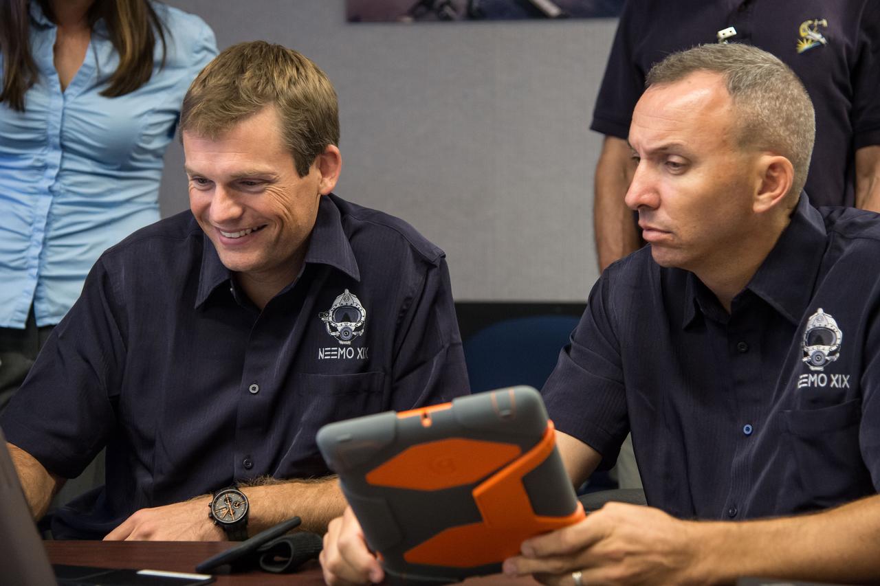 Date: 08-21-14 Location: Bldg 36, 131 Subject: ESA Astronaut Andreas Mogensen and NASA astronaut Randy Bresnik during NEEMO 19 communications training with instructors Marcum Reagan and Barbara Janoiko Photographer: James Blair