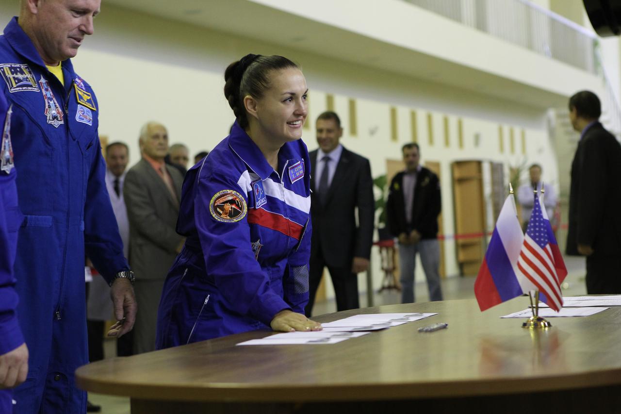 1867:  At the Gagarin Cosmonaut Training Center in Star City, Russia, Expedition 41/42 Flight Engineer Elena Serova of the Russian Federal Space Agency (right) flashes a smile September 3 as NASA’s Barry Wilmore (left) looks on at the start of final qualification exams. Along with Alexander Samokutyaev of Roscosmos, they will launch September 26 from the Baikonur Cosmodrome in Kazakhstan, Kazakh time, in the Soyuz TMA-14M spacecraft for a 5 ½ month mission on the International Space Station. Serova will become only the fourth Russian woman to fly in space and the first Russian woman to conduct a long duration mission on the station.  NASA/Stephanie Stoll 