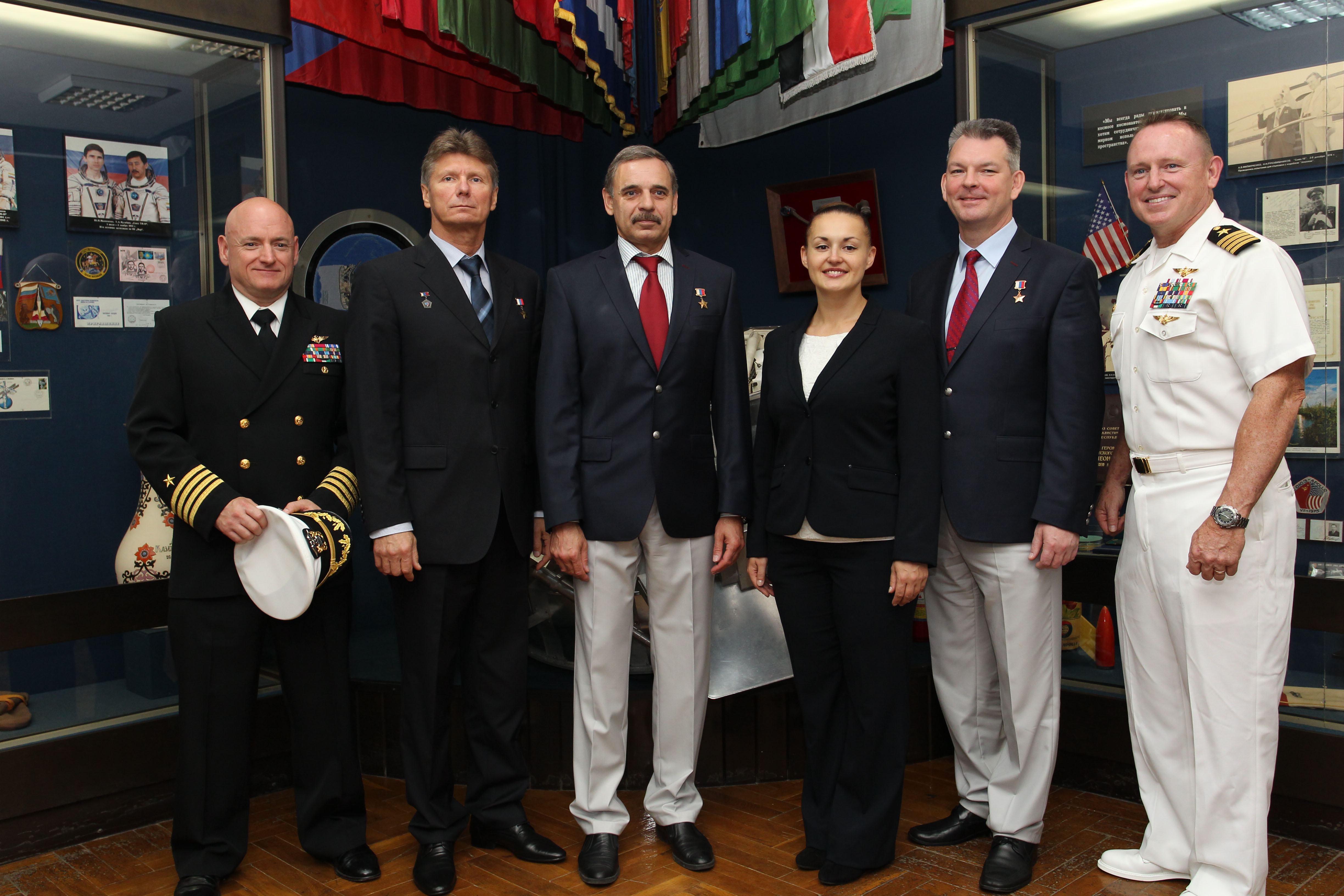 2430:  At the Gagarin Cosmonaut Training Center in Star City, Russia, the Expedition 41/42 prime and backup crews pose for pictures Sept. 5 at the Gagarin Museum. From left to right are backup crewmembers Scott Kelly of NASA, Gennady Padalka of the Russian Federal Space Agency (Roscosmos) and Mikhail Kornienko of Roscosmos, and prime crewmembers Elena Serova of Roscosmos, Soyuz Commander Alexander Samokutyaev of Roscosmos and Barry Wilmore of NASA. Wilmore, Samokutyaev and Serova will launch from the Baikonur Cosmodrome in Kazakhstan on Sept. 26, Kazakh time, in their Soyuz TMA-14M spacecraft for a 5 ½ month mission on the International Space Station. Serova will become the fourth Russian woman to fly in space and the first Russian woman to conduct a long duration mission on the station. Kelly and Kornienko will launch in March 2015 to spend a full year on the complex.  NASA/Stephanie Stoll 